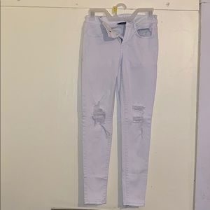 American Eagle white ripped skinny jeans